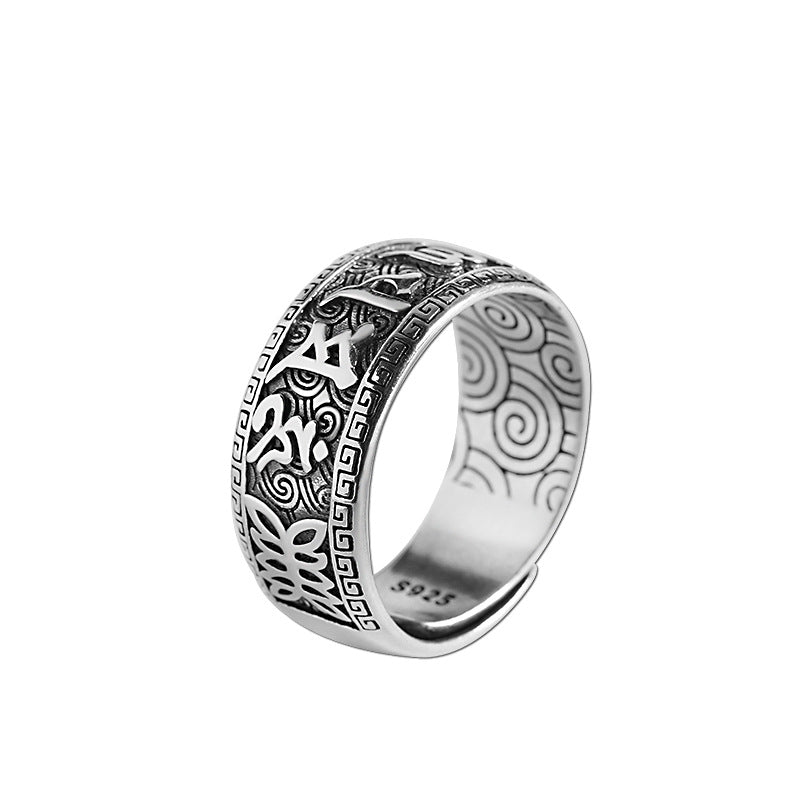 Cincin terbuka perak dengan mantra enam suku kata dan tenaga pelindung.